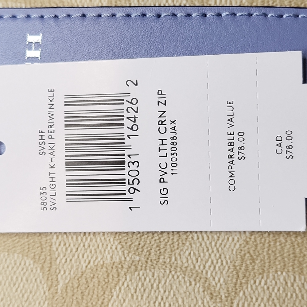 New with tags- Coach Periwinkle Wristlet - Picture 6 of 6